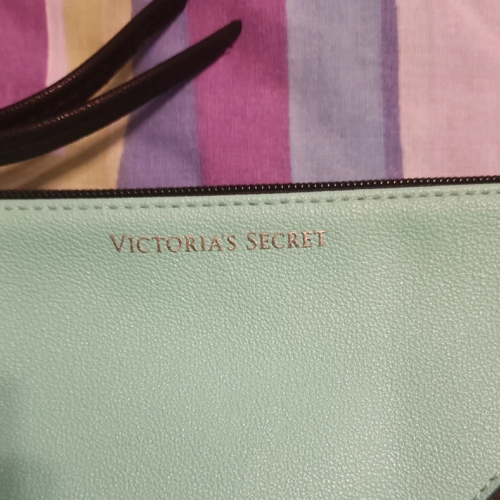 Victoria's Secret Black and Green Wristlet with Sleek Design